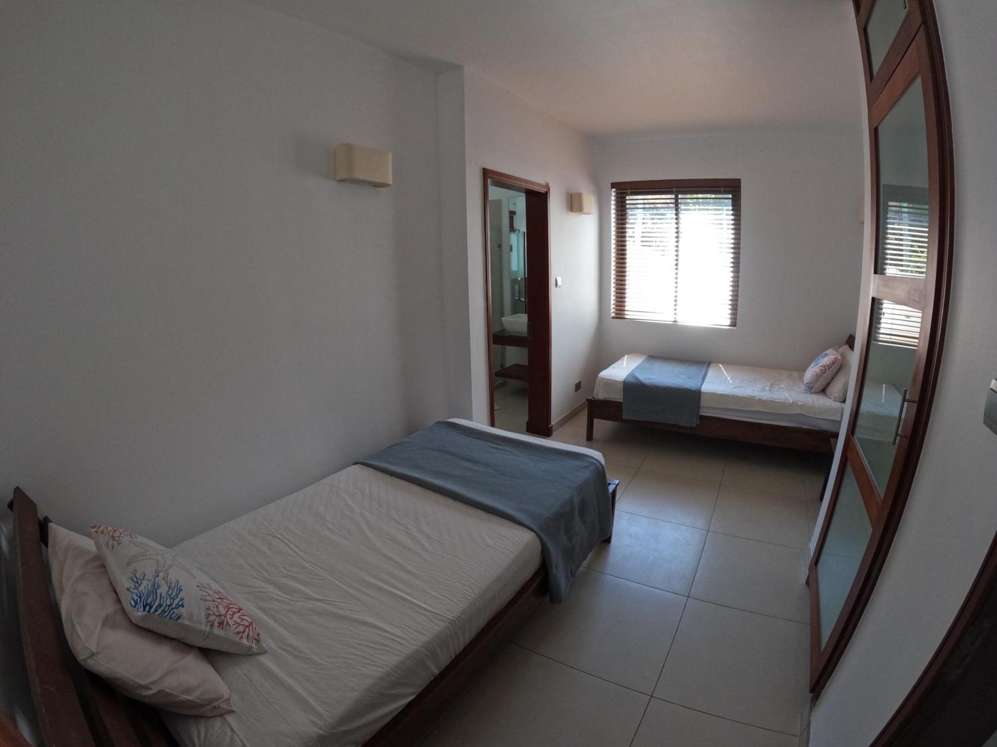 Olana Blue - Beachfront Apartment Rivière Noire Eksteriør billede